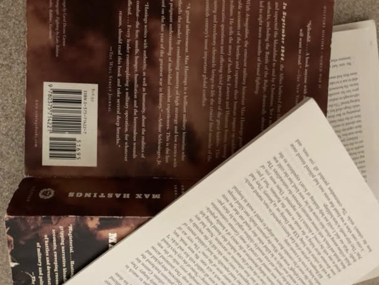 A book with a broken spine and pages falling out